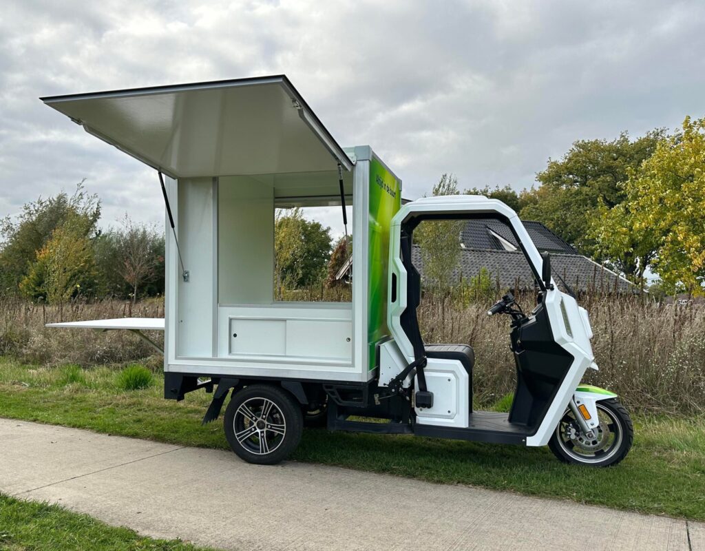Flinc-EV elektrische Tuktuk Pop-Up